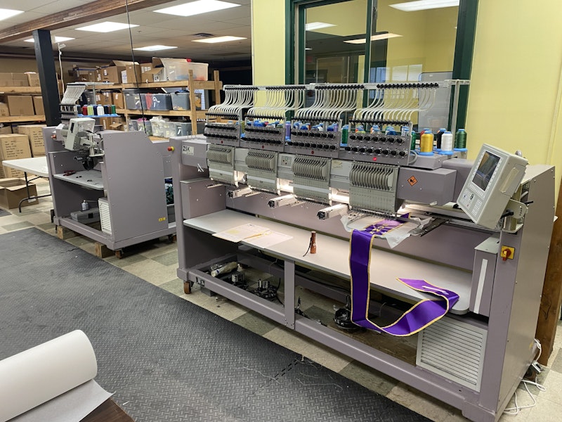 An industrial embroidery machine in the East Coast Printers shop.