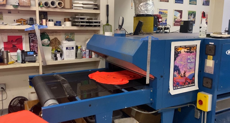 A dye sublimation heat press machine in the East Coast Printers shop.